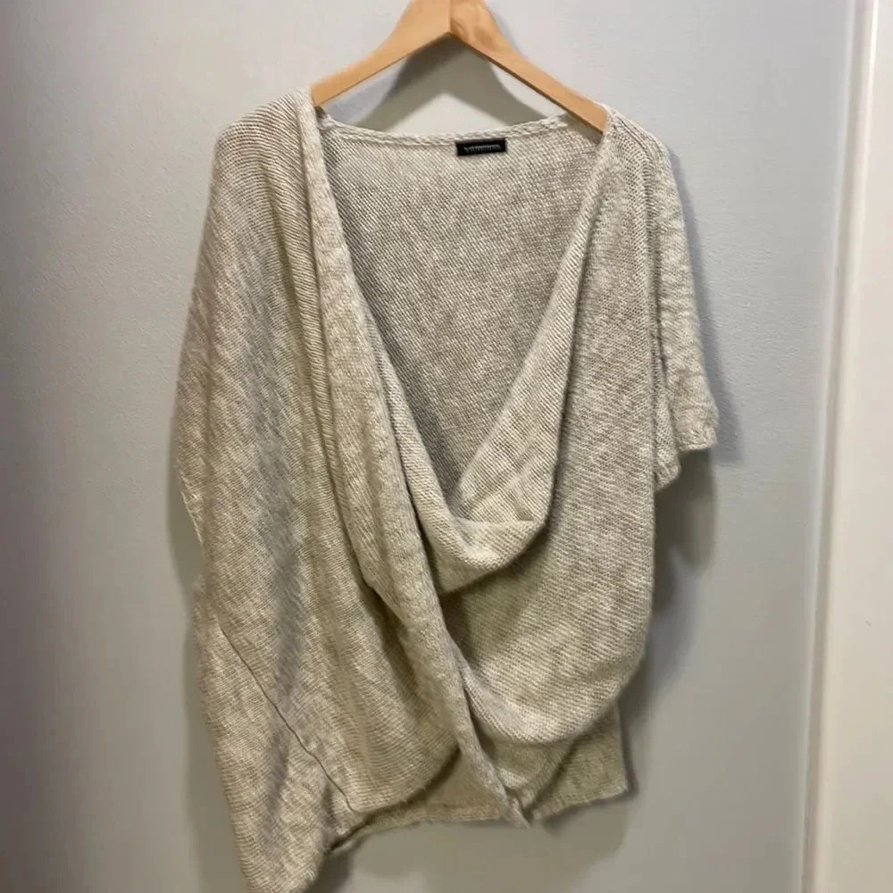 Anthropologie woman’s twisted poncho oatmeal colored sweater